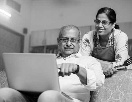 Man and woman looking at computer